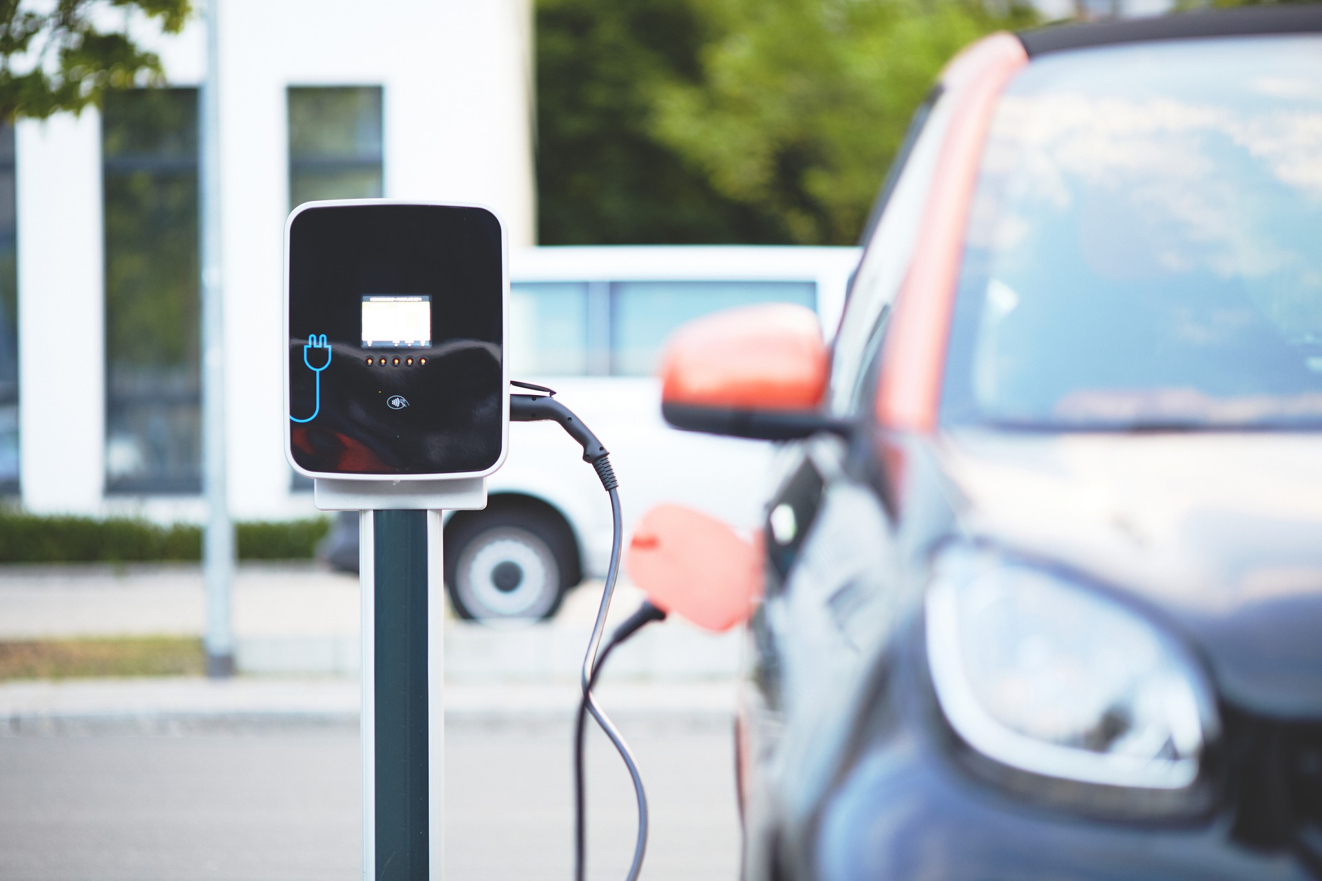 An electric vehicle being charged