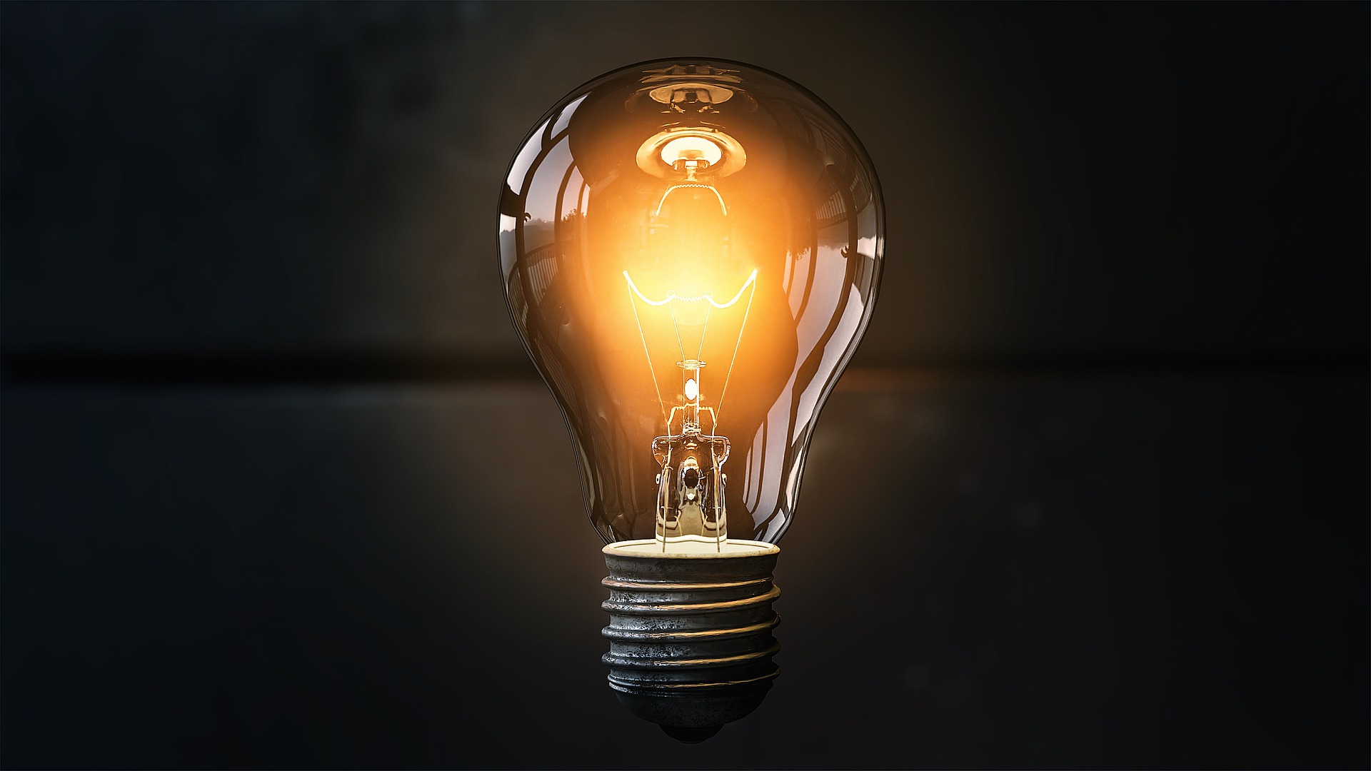 Image of a lit up light bulb showing the idea of the sustainable investment fund portrayed in the article