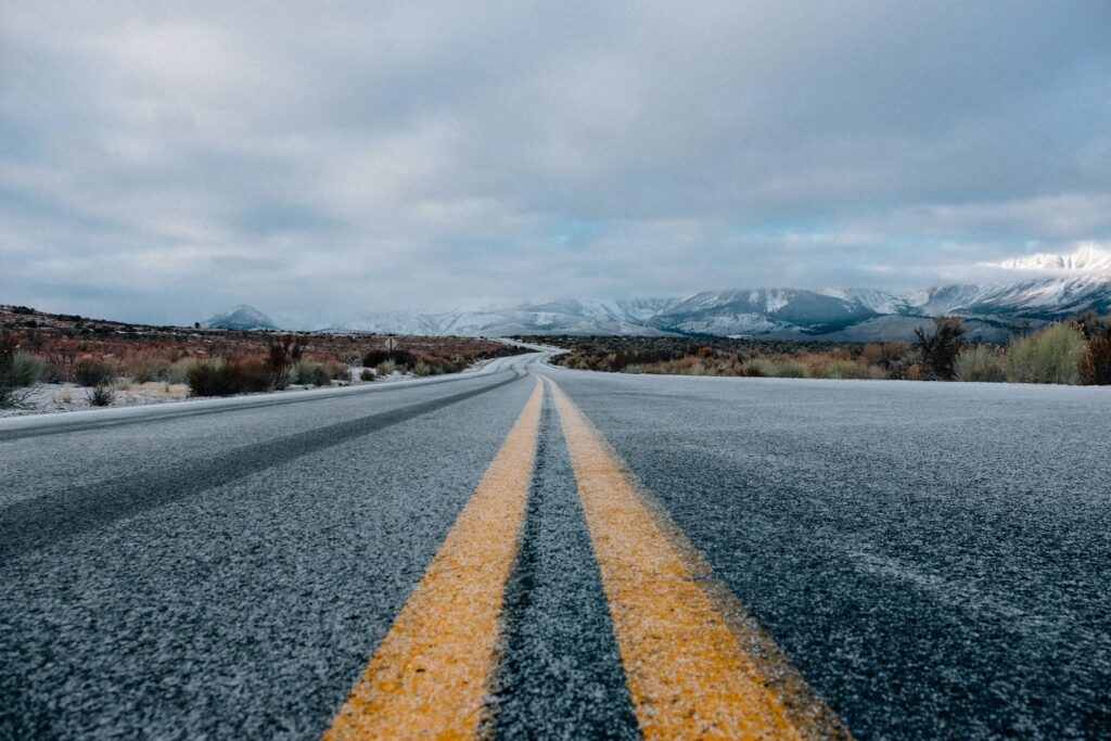 Scenic open road highlighting the freedom and adventure made possible by the best electric cars for teens, inspiring eco-friendly travel.