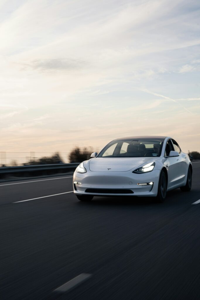 White product label on dark background representing pricing strategy—the best way to sell a Tesla for maximum value.