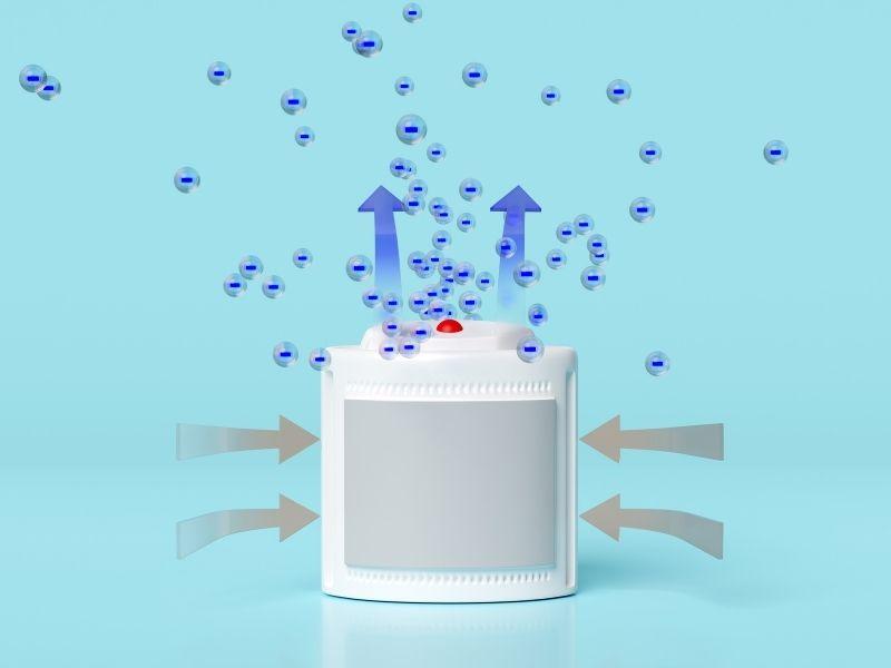Illustration of an ozone air purifier releasing charged particles into the air, raising health concerns about are ozone air purifiers safe.