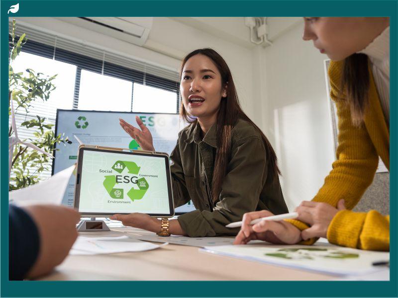 Asian business leaders meeting ESG strategize on sustainable environmental practices