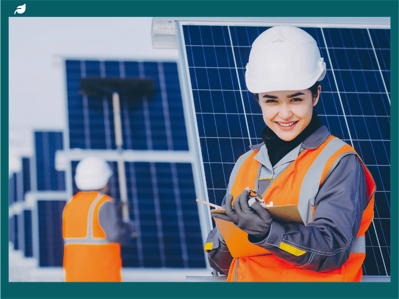 Solar technician inspecting solar panels, illustrating whether solar panels are worth it in the UK for home and commercial energy savings.