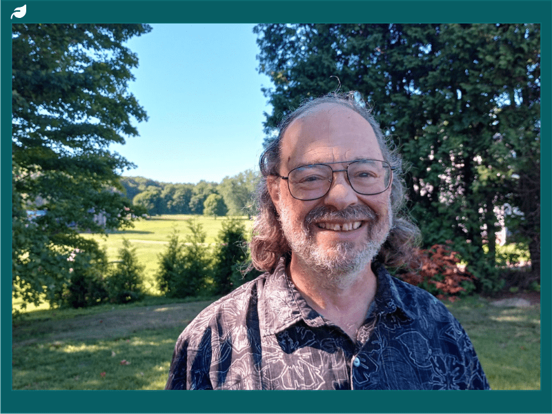 Shel Horowitz Green Profitability Consultant poses outdoors for a photo