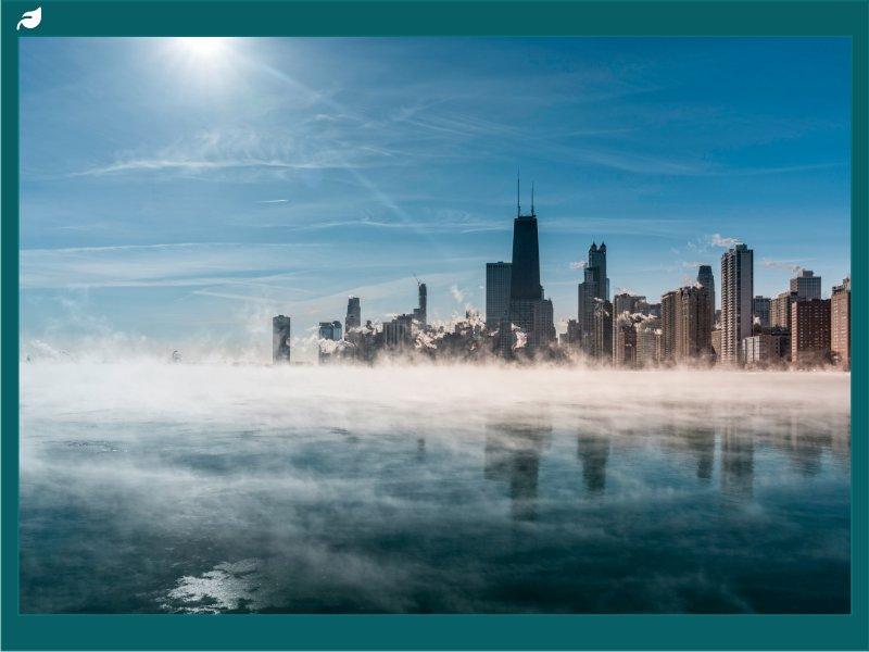 Steam rises off frozen Lake Michigan before Chicago skyline in extreme cold