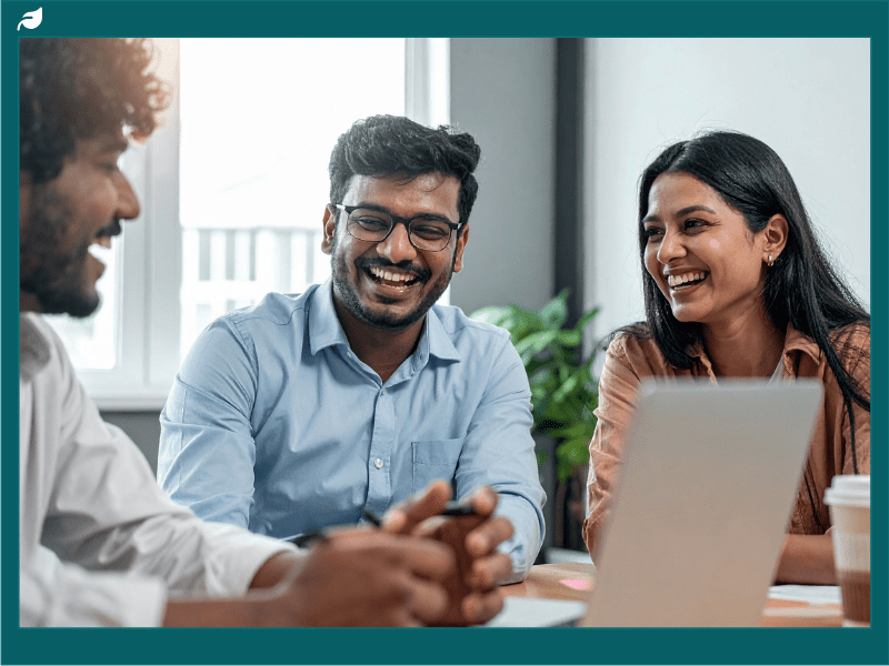 Diverse Business Team Laughing in Meeting