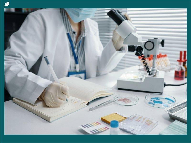 Scientist Conducting Research with Microscope in Laboratory
