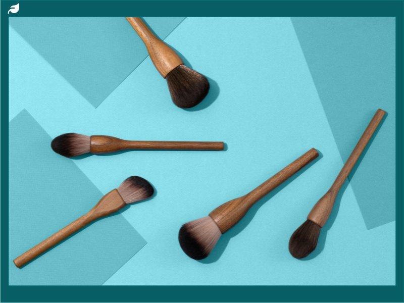 Natural Wood Vegan Makeup Brushes on Blue Background