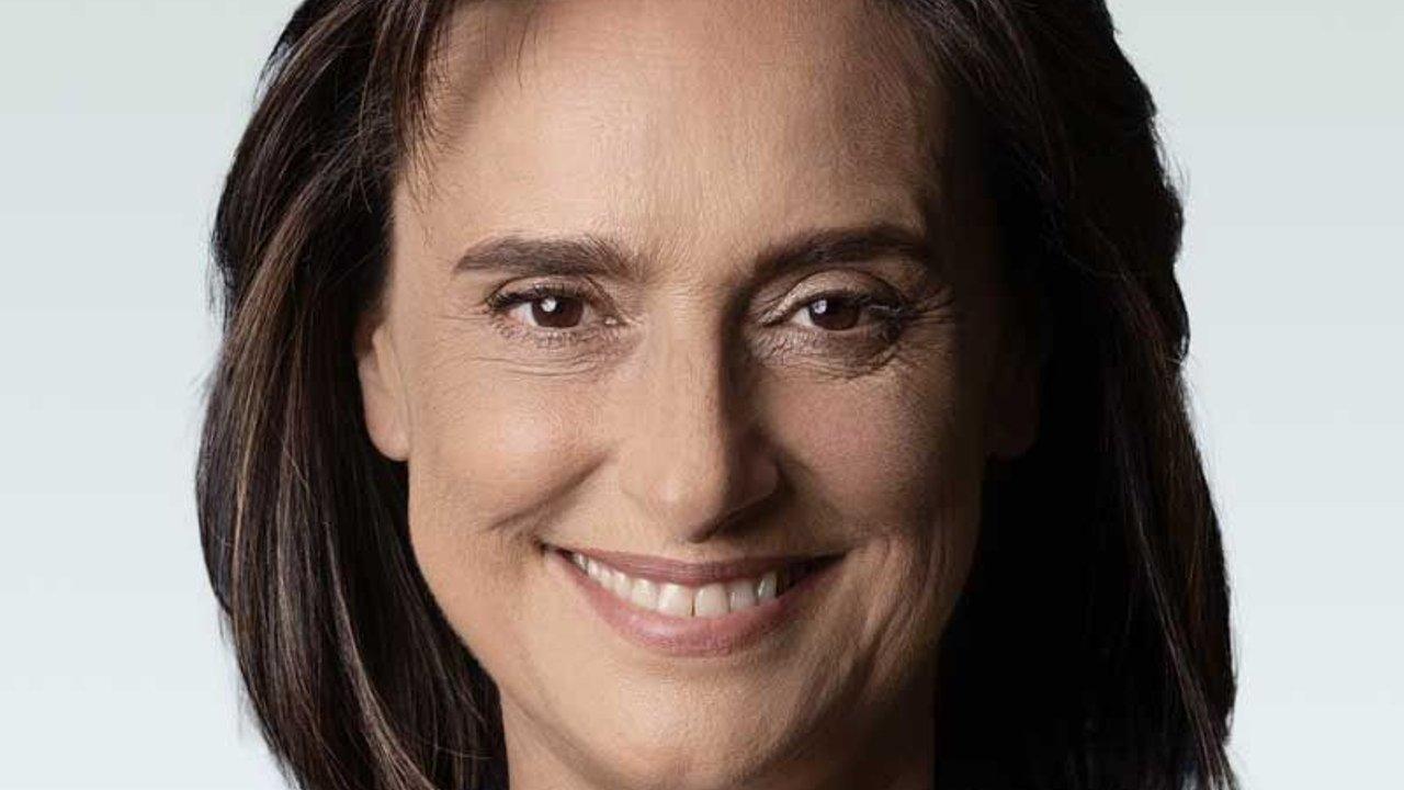 Headshot of Marisa Trisolino smiling against a pale background.