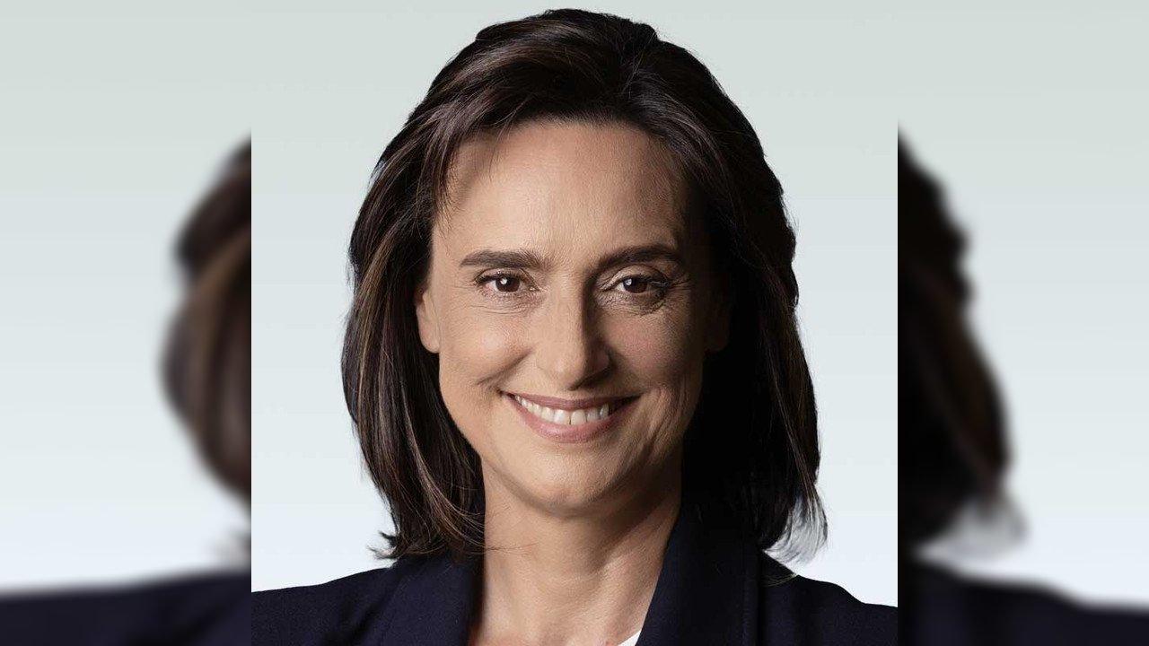 Headshot of Marisa Trisolino smiling against a pale background.