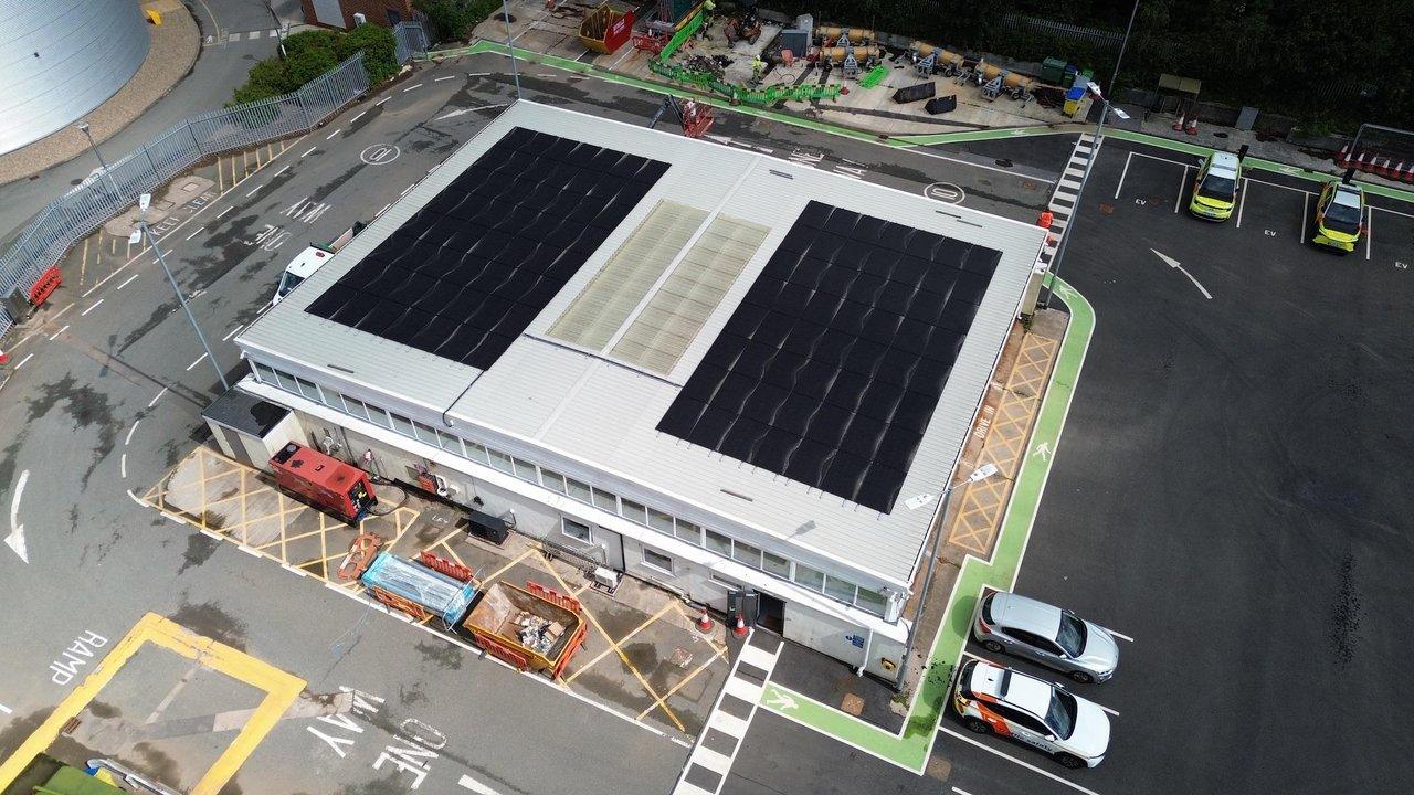 Aerial view of solar panels installed on a National Highways depot roof