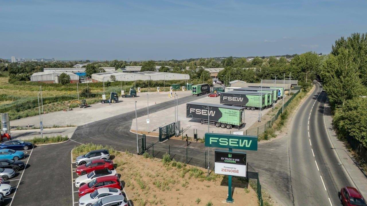 Aerial view of FSEW's Wales HGV electric charging hub with electric trucks and charging stations