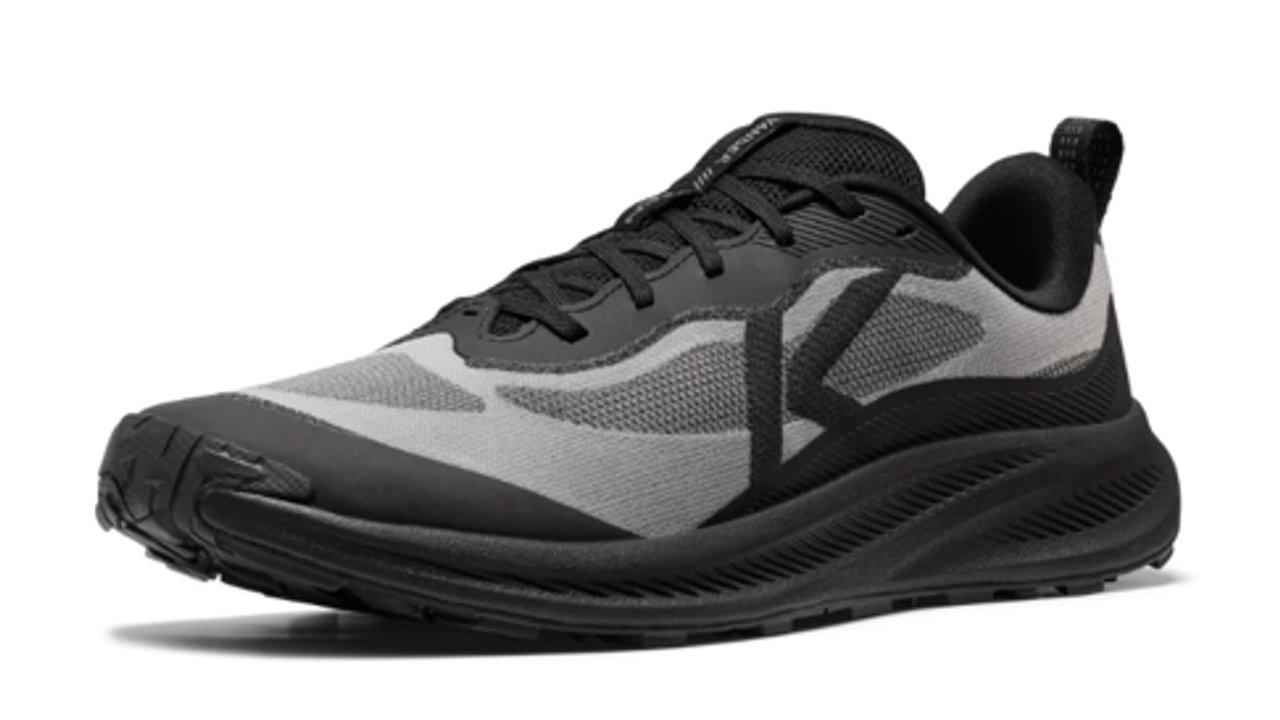 Black and gray athletic running shoe with laces and a thick black sole.