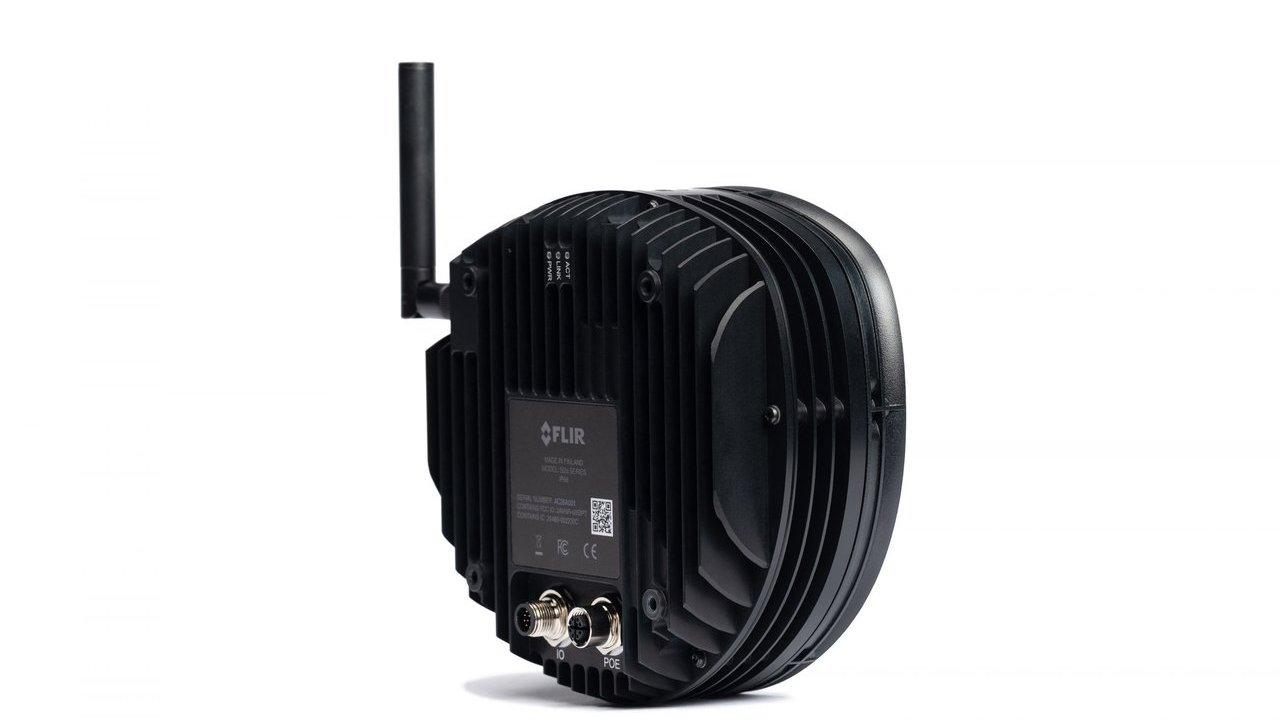Black FLIR thermal camera with cooling fins, antenna, and connector ports on a white background.