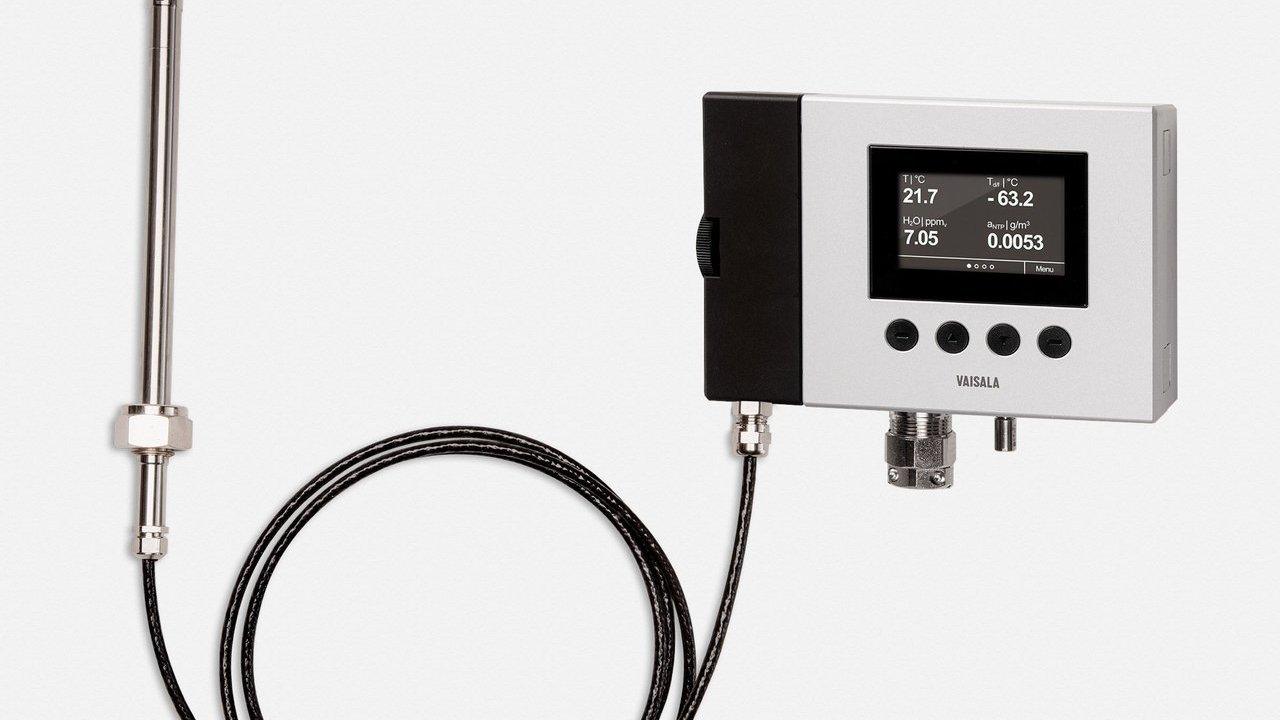 Vaisala dew point instrument with display, control buttons, cable and stainless steel probe.