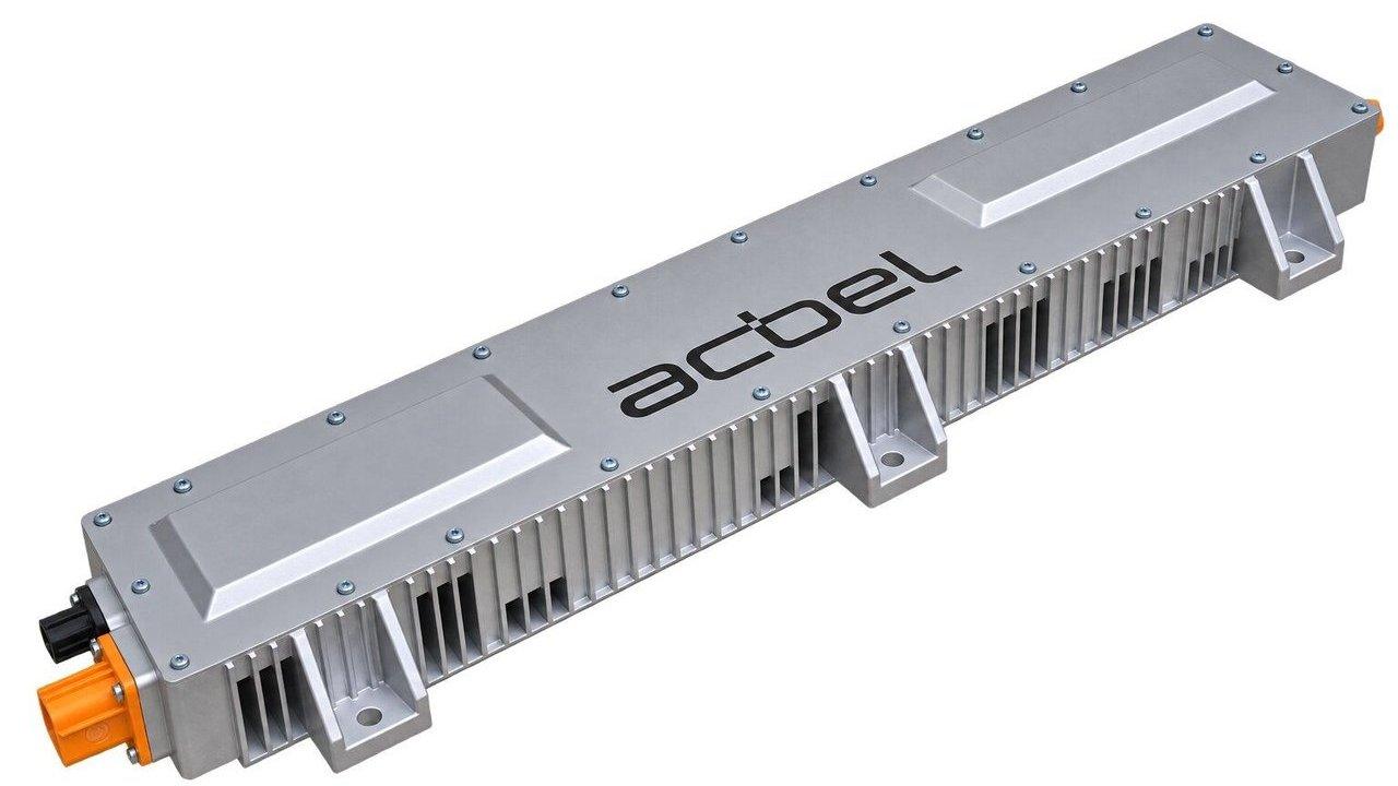 Silver Actel 11 kW passive-cooled power unit with cooling fins and orange connector.
