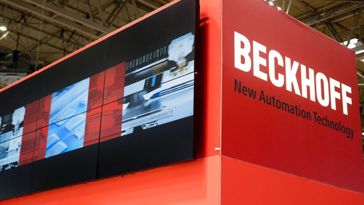 Beckhoff exhibition stand with a video wall and “New Automation Technology” signage
