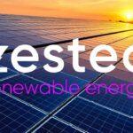 Solar panels at sunset with Zestec renewable energy text overlay